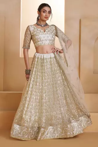 Off White net sequin embroidered lehenga set with choli and dupatta