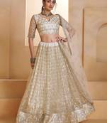 Off White net sequin embroidered lehenga set with choli and dupatta