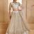 Off White net sequin embroidered lehenga set with choli and dupatta