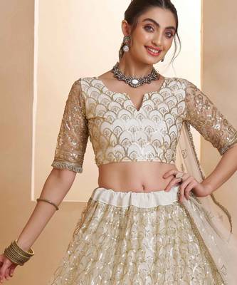 Off White net sequin embroidered lehenga set with choli and dupatta 3