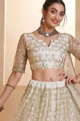 Off White net sequin embroidered lehenga set with choli and dupatta
