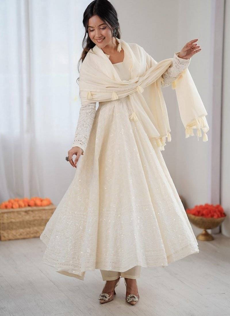 ivory anarkali suit with tassel dupatta