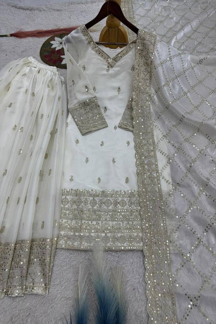white embroidered suit with dupatta