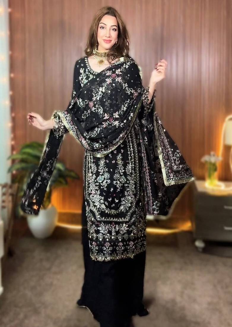 black heavily embroidered festive suit