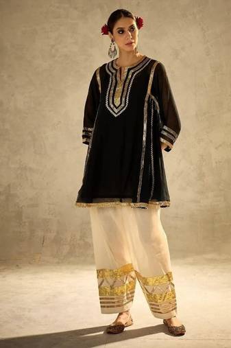 black flared kurta with gold border palazzo