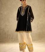 black flared kurta with gold border palazzo