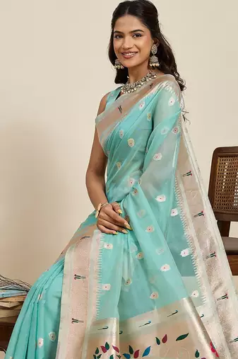 rama green art silk woven kanjivaram silk saree with blouses