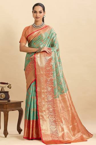 green art silk woven kanjivaram silk saree with blouses