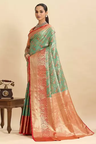 green art silk woven kanjivaram silk saree with blouses