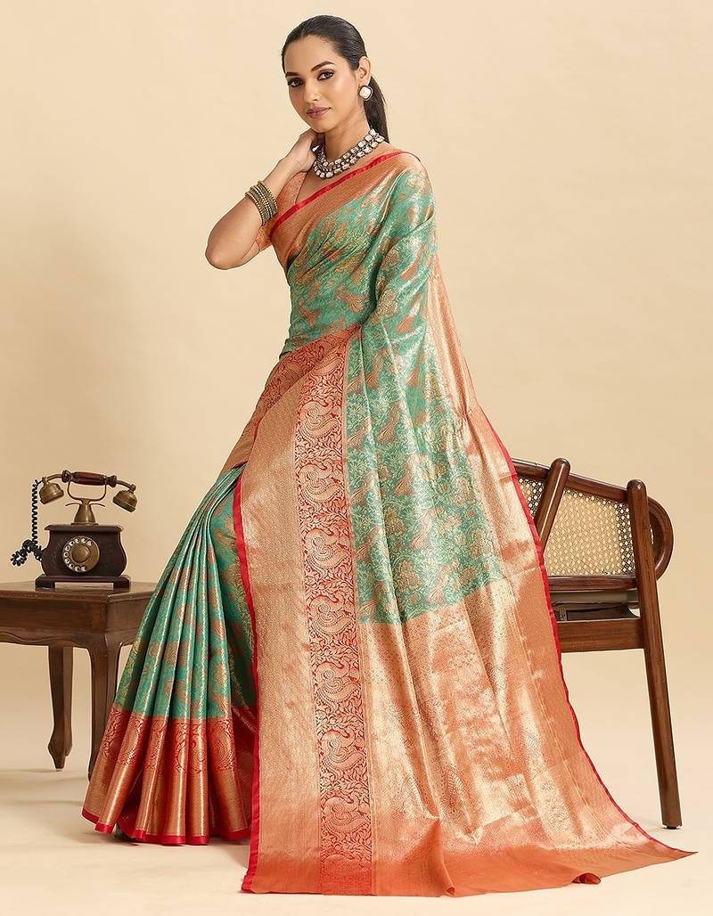 green art silk woven kanjivaram silk saree with blouses