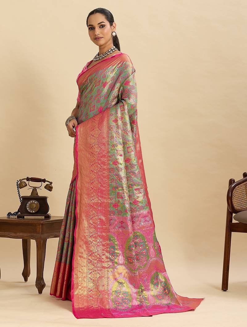 green art silk woven kanjivaram silk saree with blouses