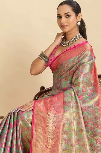 green art silk woven kanjivaram silk saree with blouses