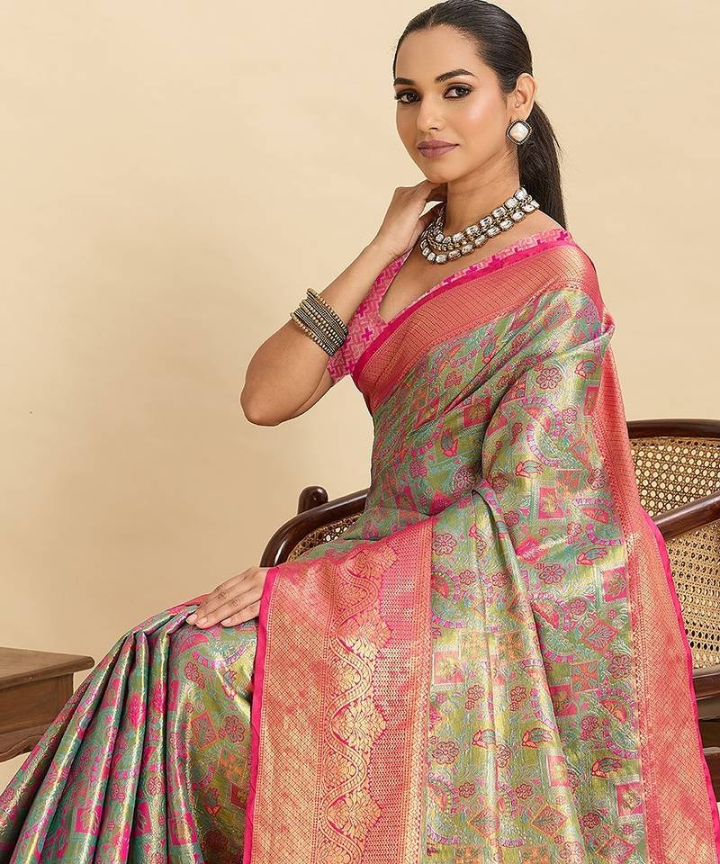 green art silk woven kanjivaram silk saree with blouses