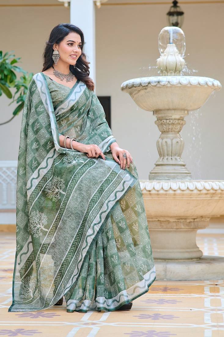 green printed pure cotton green saree with blouse