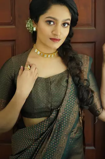 green silk blend banarasi saree with unstitched blouse piece