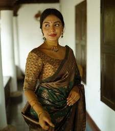 green silk blend banarasi saree with unstitched blouse piece