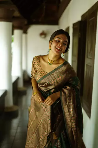 green silk blend banarasi saree with unstitched blouse piece