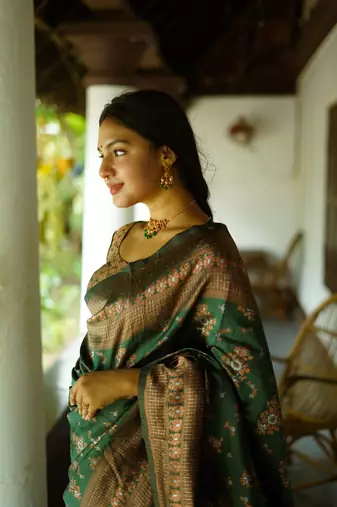 green silk blend banarasi saree with unstitched blouse piece