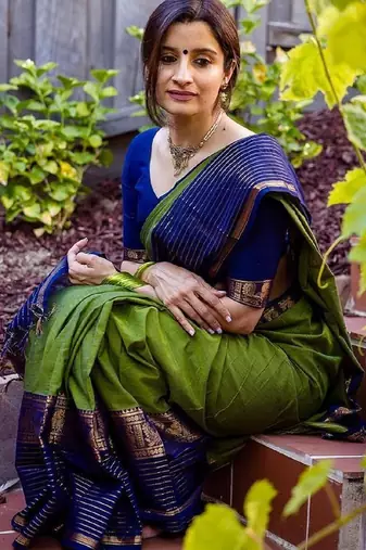 mehendi blue silk blend banarasi saree with unstitched blouse piece