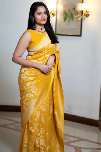 yellow silk blend banarasi saree with unstitched blouse piece