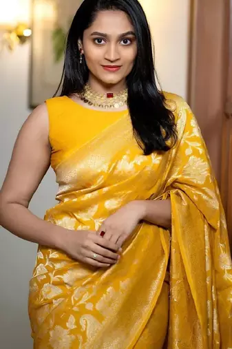 yellow silk blend banarasi saree with unstitched blouse piece