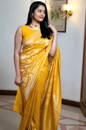 yellow silk blend banarasi saree with unstitched blouse piece
