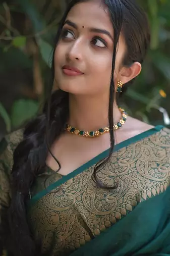green silk blend banarasi saree with unstitched blouse piece