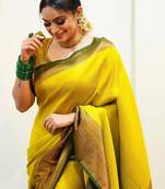 yellow silk blend banarasi saree with unstitched blouse piece