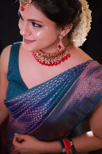 rema silk blend banarasi saree with unstitched blouse piece