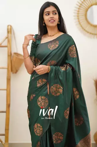 green silk blend banarasi saree with unstitched blouse piece