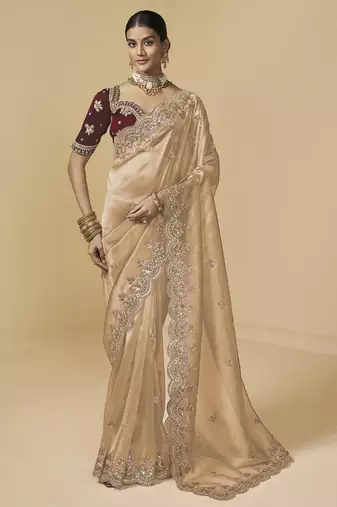 Golden embroidered tissue party wear saree with designer blouse fabric