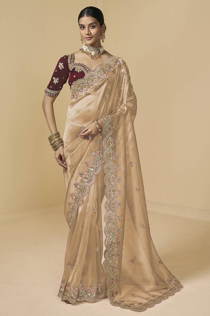 Golden embroidered tissue party wear saree with designer blouse fabric