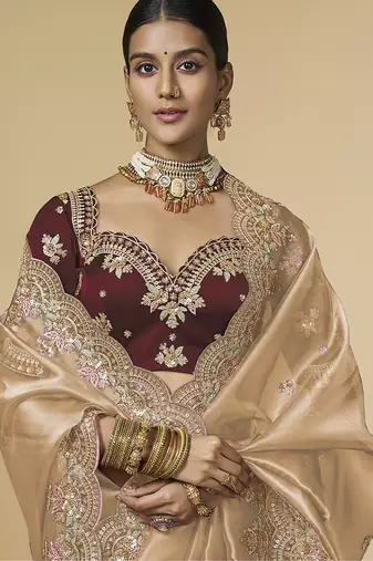 Golden embroidered tissue party wear saree with designer blouse fabric