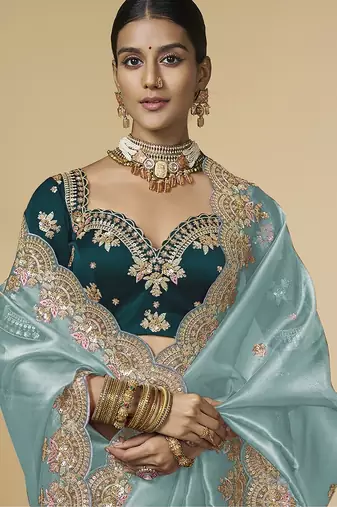 Sea-sky embroidered tissue party wear saree with designer blouse fabric