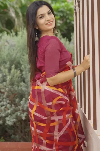red geometric print cotton blend saree with blouse piece