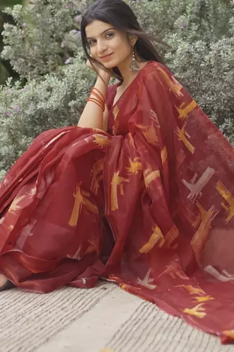 red geometric print cotton blend saree with blouse piece