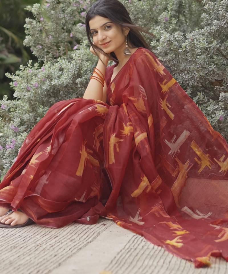 red geometric print cotton blend saree with blouse piece