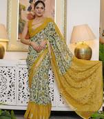 green floral kalamkari  cotton blend saree with blouse piece