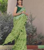 green shibori geometric print cotton blend saree with blouse piece