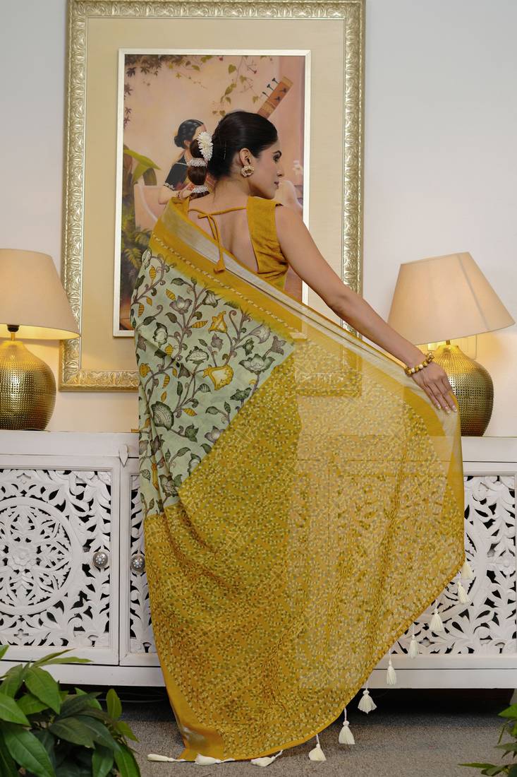 green floral kalamkari  cotton blend saree with blouse piece