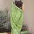 green shibori geometric print cotton blend saree with blouse piece