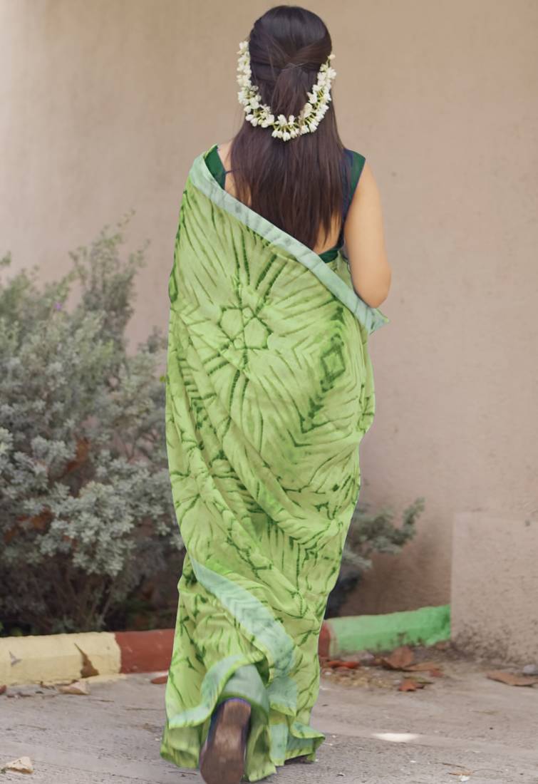 green shibori geometric print cotton blend saree with blouse piece