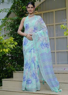 turquoise floral print cotton blend saree with blouse piece 1