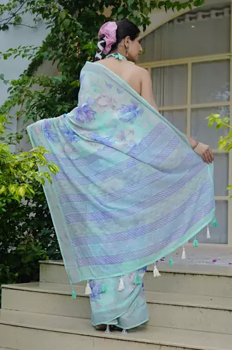 turquoise floral print cotton blend saree with blouse piece