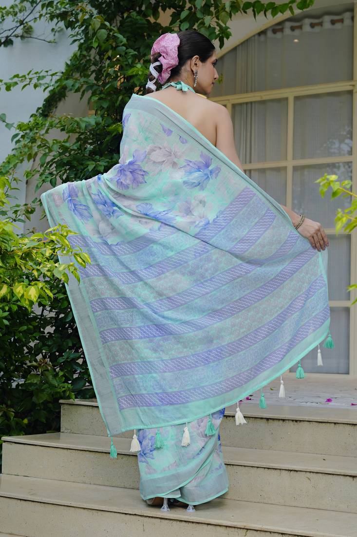 turquoise floral print cotton blend saree with blouse piece