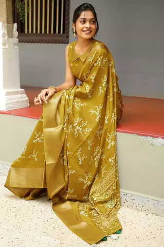 green geometric print cotton silk saree with blouse piece