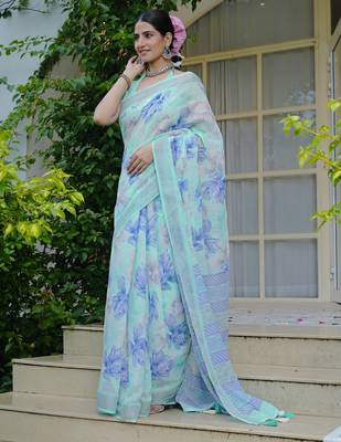 turquoise floral print cotton blend saree with blouse piece 4