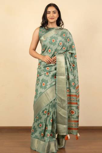 green geometric print cotton silk saree with blouse piece