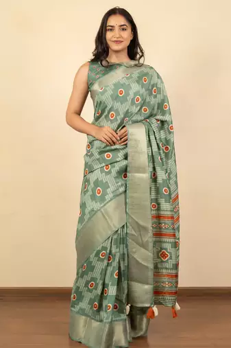 green geometric print cotton silk saree with blouse piece