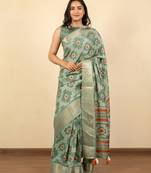 green geometric print cotton silk saree with blouse piece